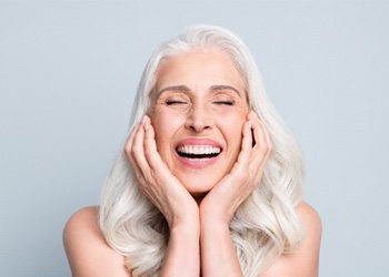  gray-haired elderly lady laughing