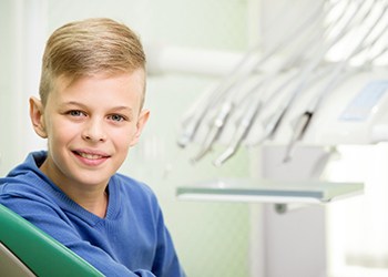 Teenaged boy in dentist’s chair